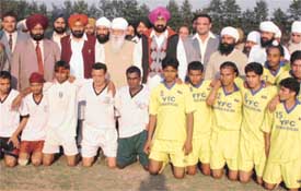Mr Jagmohan Singh Kang, Sports and Animal Husbandry, Dairies and Fisheries Minister, Punjab, with the football teams at 4th Attal Partapi Sports Tournament