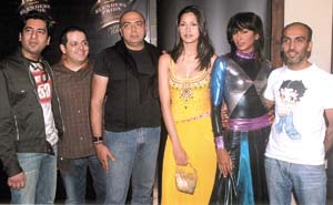 Fashion designers and models at the launch of Blender’s Pride fashion tour 2004 in the Capital on Monday.