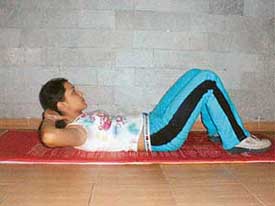 Rashmi, an aerobics instructor with Oceanic, Panchkula, performs an abdominal crunch