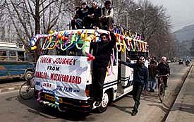 A bus carrying activists of the Jammu and Kashmir Realistic Front during a token journey from Srinagar to Muzafferabad in Srinagar on Tuesday.