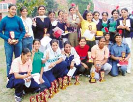 Winners in jubilant mood after the prize distribution function of the annual athletics meet of the Government College for Women in Ludhiana 