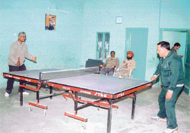 A table tennis match between O.N. Sharma and Y.N. Joshi in progress at the annual sports meet of the Bank of India