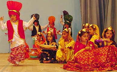 Kids present a bhangra during the annual function of the nursery section of Guru Nanak Public School