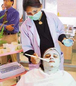 A customer receives skin treatment as part of VLCC Spring Fest