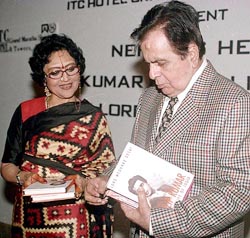 Bollywood thespian Dilip Kumar and former actress Vyjayanthimala Bali take a look at the book, Nehrus Heroes: Dilip Kumar in the Life of India, at its release function 