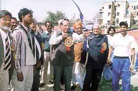 Archery Association of India president Vijay Kumar Malhotra aims at the bulls eye 
