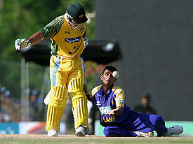 Sri Lankan bowler Upul Chandana catches Australian batsman Damien Martyn