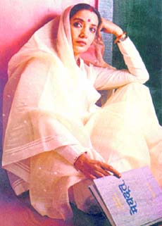 Shabana Azmi in and as Godmother
