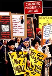 Young Sikhs demonstrate against the French government's planned ban on students wearing headscarves and all other overt religious symbols in state schools