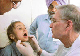 A child being examined by a doctor at Civil Hospital, Phase-VI