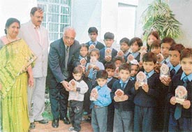 Mr Jugal Kishore Tewari gives away prizes to winners of the annual sports day of Terioat Public School, Jassian Road