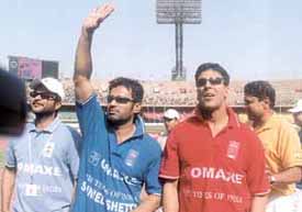 Bollywood actors Anil Kapoor, Suniel Shetty, Akshay Kumar and cricketer Kapil Dev during a charitable match, Score with a Smile, at Jawaharlal Nehru Stadium 