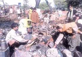 A devastating fire engulfed at least 150 jhuggis at Laxmibai Nagar in South Delhi. The fire broke out early morning on Sunday when most of the residents were asleep