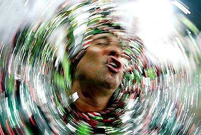 A member of the Brazilian samba school Grande Rio sings during their parade at the Sambodrome in Rio de Janeiro