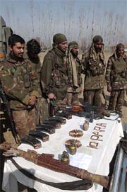 Arms and ammunition seized from Hizbul Mujahindeen commanders on display in Pulwama on Tuesday. 