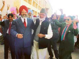 Dr K.S. Aulakh, Vice-Chancellor, Punjab Agricultural University, dances with Dr Hafid Abdul Qayyum, seniormost member of the Pakistani delegation