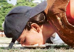A student of MCM DAV College for Women participates in an obstacle race