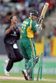South Africas Boeta Dippenaar is bowled by New Zealands Chris Cairns during their 5th ODI match at Eden Park in Auckland