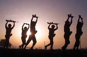 BSF jawans run during their morning exercise