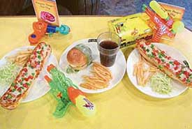 The kiddie burger along with Holi gift water pistol toys and footlongs at Hot Millions II, Sector 17