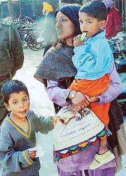 The rescued children with their mother