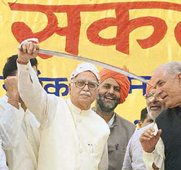 Deputy Prime Minister L.K. Advani brandishes a sword during the Vijay Sankalp Rally in Palwal, Faridabad district, on Wednesday.