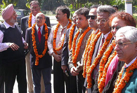 The Pakistani delegation is welcomed with garlands at Government College, Sector 11, Chandigarh, on Thursday