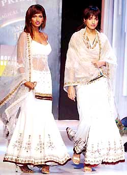 Models display creations by designer Rocky S during a fashion show in New Delhi