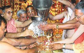 ISKCON devotees perform "mahabhishek" of Lord Chaitanya Mahaprabhu at Hare Krishna Dham, Sector 36, Chandigarh, on Saturday.