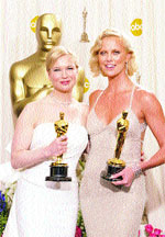 Charlize Theron (right) and Renne Zellweger with their Oscars for Best Actress and Best Supporting Actress, respectively.