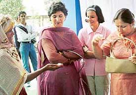 As Chandigarh paid tributes to womanhood on InternationalWomen’s Day, a woman in Sector 34 digs into her purse to help another get a meal