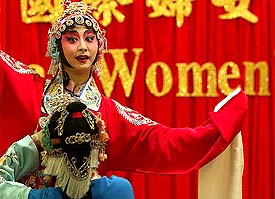 Chinese opera singers stage a drama during a party organised by Taiwan's National Women's League to celebrate International Women's Day in Taiwan
