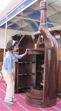 A little visitor admiring a bottle bar at the ‘Made in Pakistan’ exhibition on the last day at the Talkatora Stadium in the Capital
