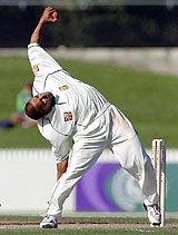 South African spinner Paul Adams bowls in his unique action on the second day of the first Test against New Zealand