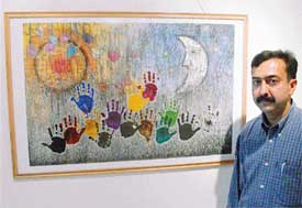 Artist Sanjay Dhawan with one of his paintings at Art Folio in Sector 9