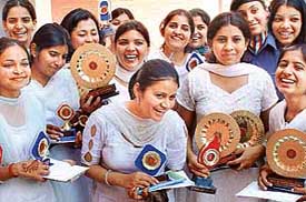 Students of Guru Gobind Singh College for Women, Sector 26, with their trophies at the annual prize distribution function in Chandigarh