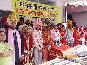 Four couples who were married off at the Deep Nagar Gurdwara, Ludhiana, on Sunday.