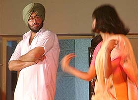 Students of Guru Nanak Dev University take part in a choreography at a festival in Amritsar