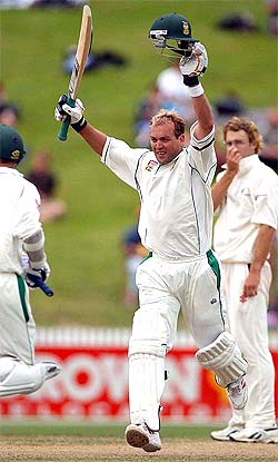 South Africa's Jacques Kallis celebrates after reaching his century on the fifth and final day of the first Test against New Zealand
