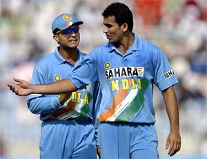 Indias captain Saurav Ganguly (left) has a word with teammate Zaheer Khan after he was hit for several boundaries in the second One-Day International between India and Pakistan in Rawalpindi