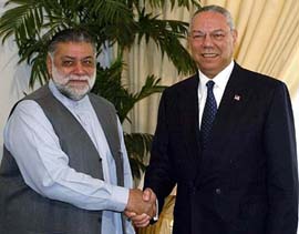 US Secretary of State Colin Powell shakes hands with Pakistan's Prime Minister Zafarullah Khan Jamali