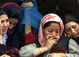 Relatives weep over the killing of Mukhtar Ahmad in Srinagar