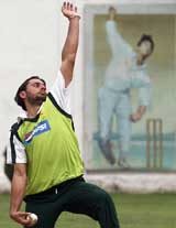 Pakistans Shahid Afridi bowls during a training session in Peshawar 