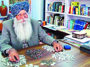 Surinder Singh with his prized collection
