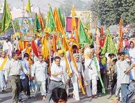 Devotees of Baba Balak Nath take out a jhanda pheri in Ludhiana