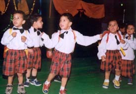 Children dance joyously at the farewell function at Mothers Touch Kindergarten School in Ludhiana 