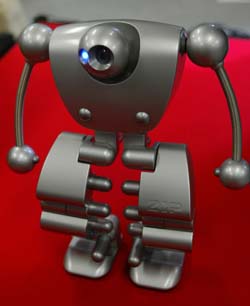 Humanoid robot maker ZMP's prototype of the new human-shaped robot 'Nuvo' walks on two legs at the company office in Tokyo.