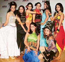 Designers of the National Institute of Fashion Design model their creations at a fashion show