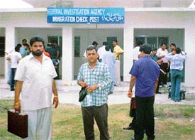 Former Chandigarh Mayor Subhash Chawla with his companion at a border check post.