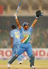 Vice-captain Rahul Dravid celebrates India's victory over Pakistan 